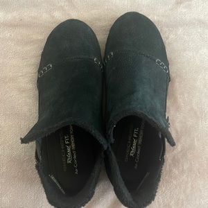 Black suede Skechers